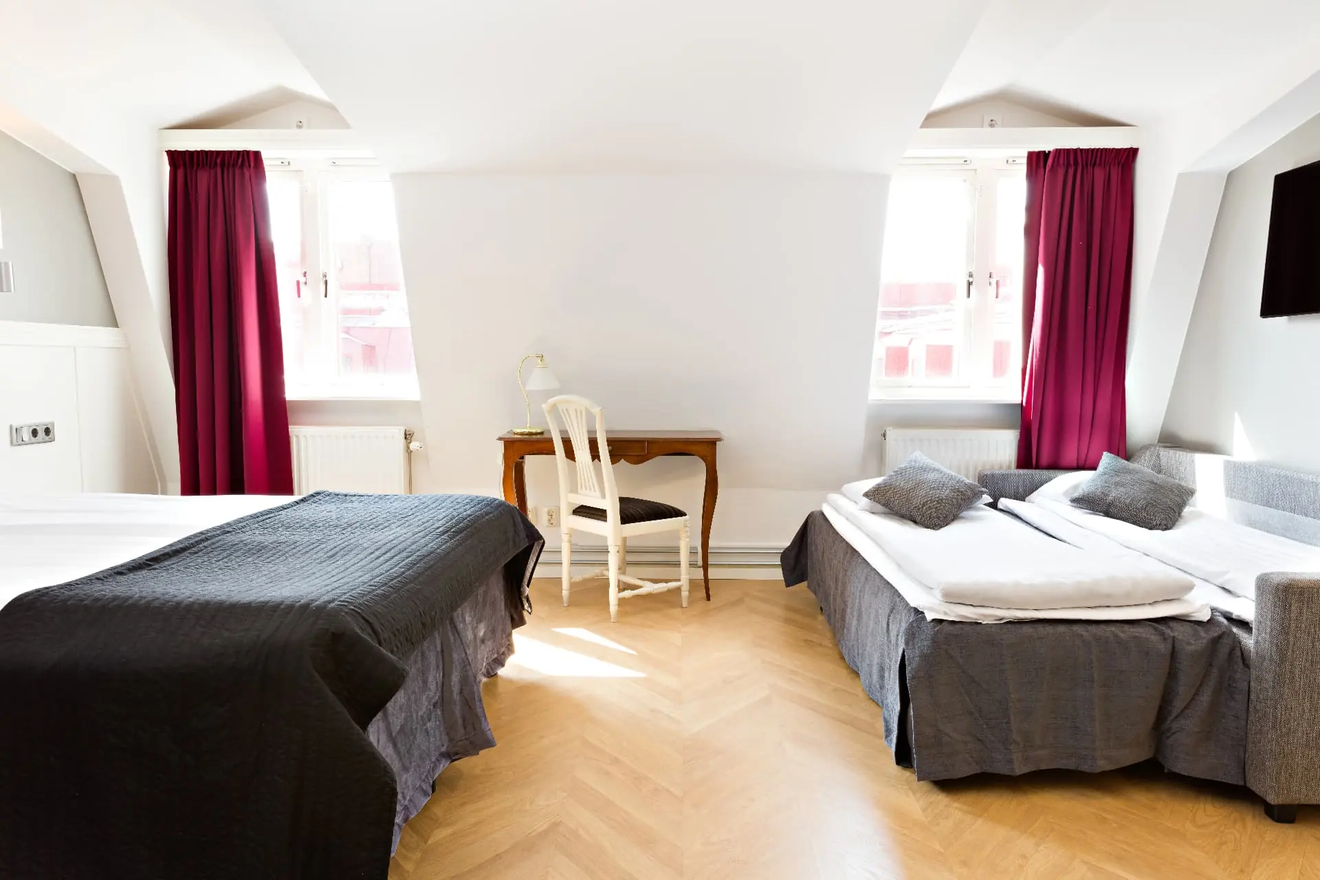 Familjerum på Hotel Vasa i takvåningen med två sängar